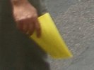 [A yellow sheet of paper]