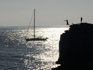 [Man jumping into the sea at Pulpit Rock]
