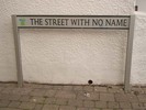 [Road name sign: The Street With No Name]